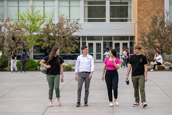 Student models for Admissions Viewbook cover options. May 2023