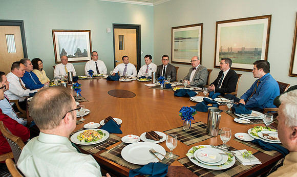 Merv Brown the Managing Director of University Relations treats the department to a luncheon in the Presidents Dining Room in the Manwaring Center.
