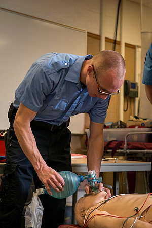 Cory Marriott and his peer pass off EMT requirements during lab held in the Clarke Building.