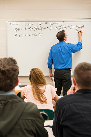 Students in a Civil Engineering class, Reinforced Concrete Design, are taught by Nathan Harris.