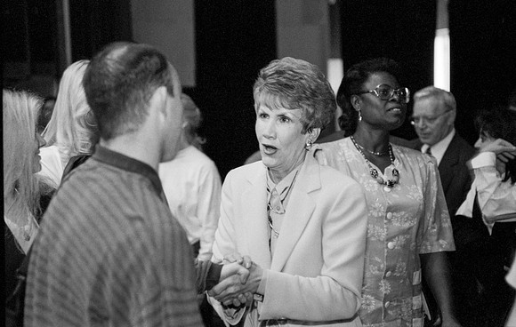 Bonnie Hammond speaks to students at Ricks College during devotional