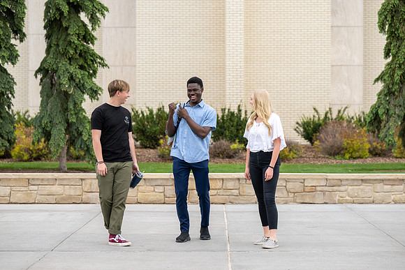 Student models for Admissions Viewbook cover options. May 2023
