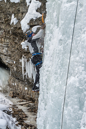Student, Dana MItchell, a Recreation Management major, ice climbing as part of Outdoor Activities.