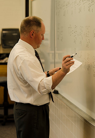 Brian Pyper teaches principles of Wave Physics to his class
