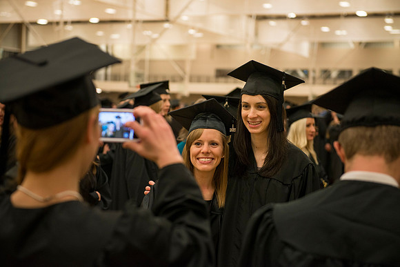 Graduates gather in I-Center before Commencement begins.