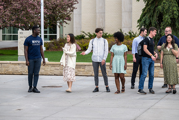 Student models for Admissions Viewbook cover options. May 2023