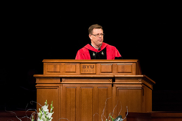 President Clark G. Gilbert giving a speech to the graduates at Commencement