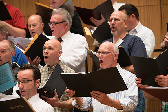 Ricks College Alumni from 1965 to 1995 gather for an A Cappella Choir reunion.