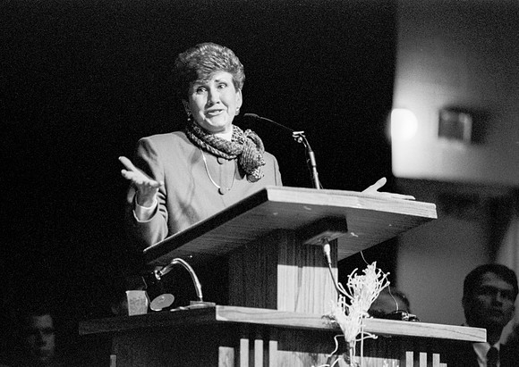 Sister Hammond speaks to students at Ricks College during devotional