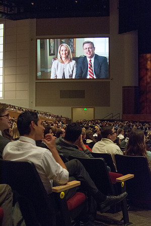 President Clark G. Gilbert and his wife Christine Gilbert show a video about their family as they speak together at devotional about the importance of building and maintaining families.