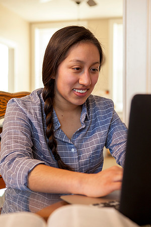 Tanya Rickenbach studies online at BYU-Idaho in her quiet apartment.