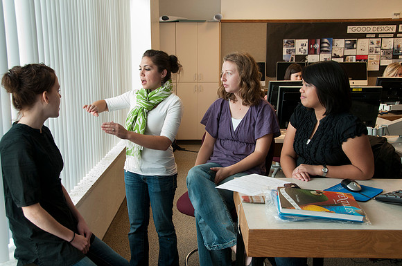 Interior Design class taught by Tahari Julander breaks into small groups to work on design projects
