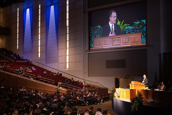 Students gather for devotional in the BYU-Idaho Center with Elder Kyle S McKay, General Authority Seventy.