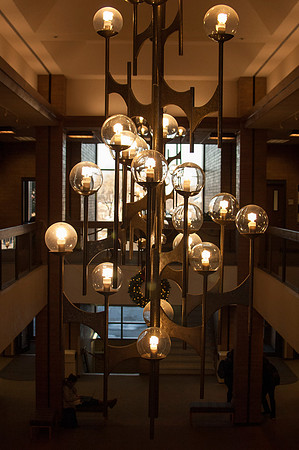 An intricate light fixture hung in the Snow Building.