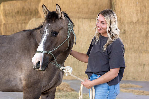 Rilie Vanderwiel, studying Animal Science, is right at home at the BYU-Idaho Animal Science Center.