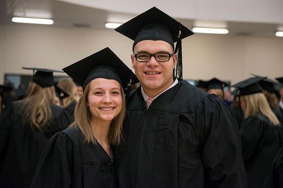 Graduates gather in I-Center before Commencement begins.