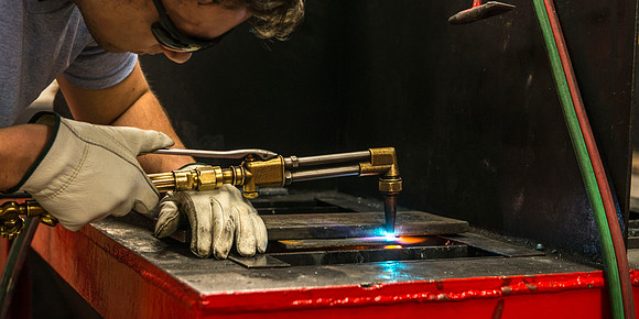 Students from the welding program, work on projects during class in the Austin Building.