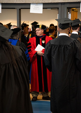Student Graduates and Faculty meet in the I-Center for Commencement.