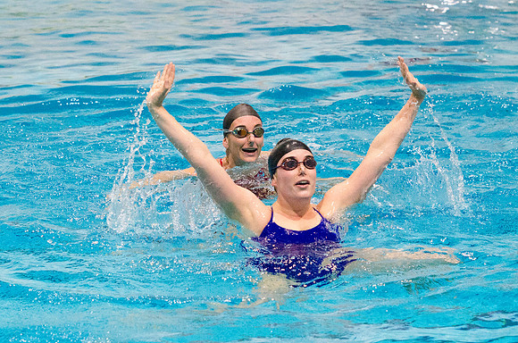 Synchronized Swimmers performing at the half time show
