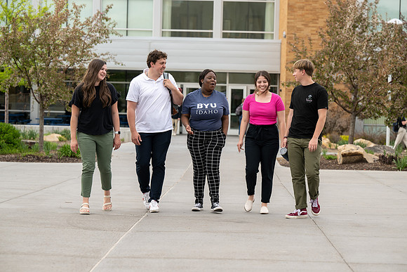 Student models for Admissions Viewbook cover options. May 2023