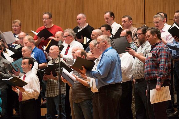 Ricks College Alumni from 1965 to 1995 gather for an A Cappella Choir reunion.
