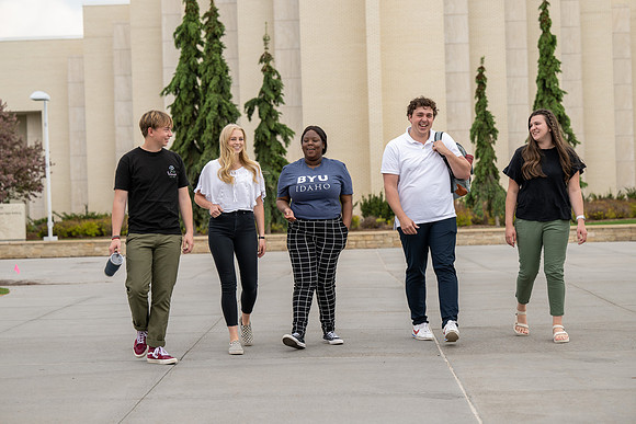 Student models for Admissions Viewbook cover options. May 2023