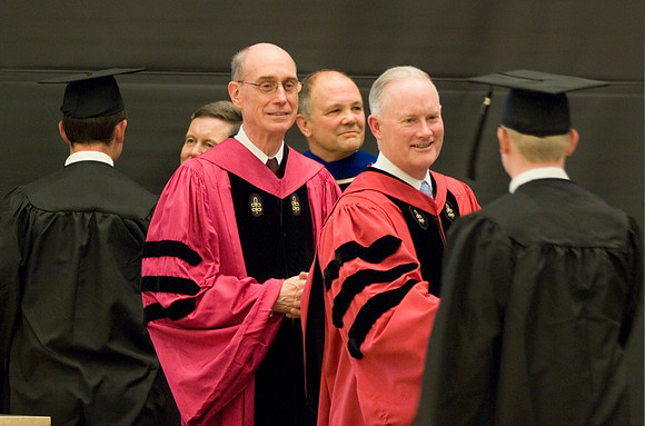 College of Physical Sciences and Enineering Convocation, Elder eyring and Pres Clark awarding diploma covers to graduates