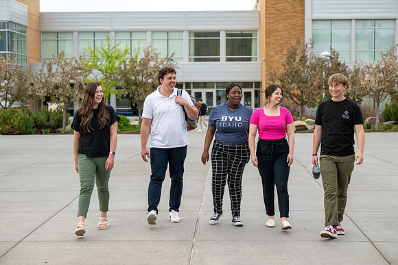 Student models for Admissions Viewbook cover options. May 2023