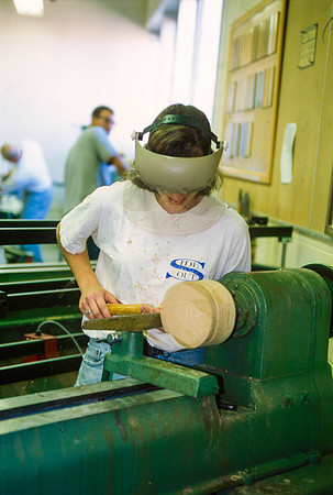 Student works diligently on a piece for Woodworking. Sep 1997.