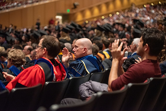 Student Graduates and Faculty meet in the I-Center for Commencement.
