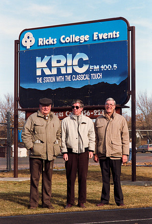 KRIC Radio group members in front of the Billboard.