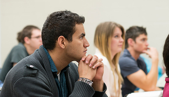 Michael Bolingbroke an instructor in the Religion Dept teaches a New Testament class.