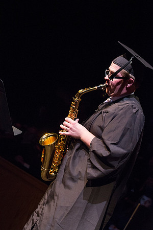 Kent Grover, Bachelor of Music, Jazz Studies, peforms a solo during convocation during the Spring Semester Graduation in the Snow Building. Photo by Tyler Rickenbach