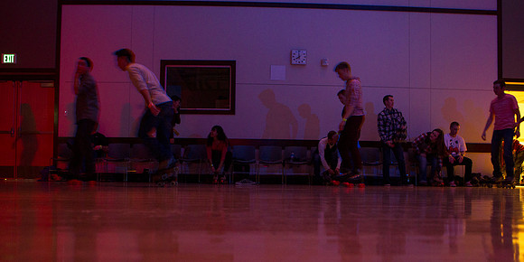 Students rollerblade during I-Night in the MC Building.