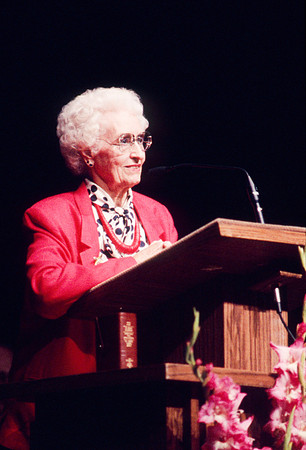 Sister Perry speaks to students at Ricks College during devotional.