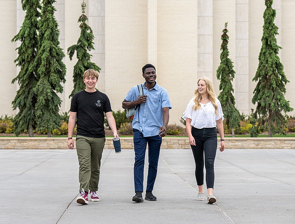 Student models for Admissions Viewbook cover options. May 2023