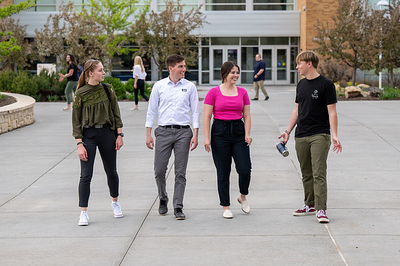 Student models for Admissions Viewbook cover options. May 2023