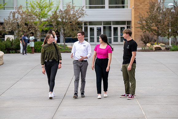Student models for Admissions Viewbook cover options. May 2023