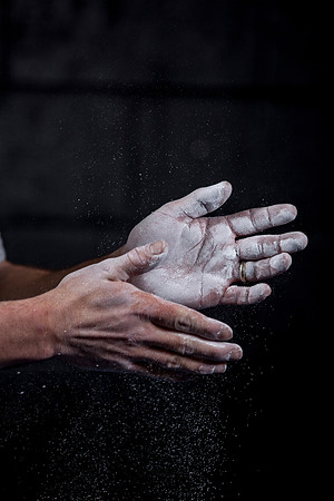 Justin Lassond is photographed while weight lifting in the Hart Gym, as part of an advertising campaign.