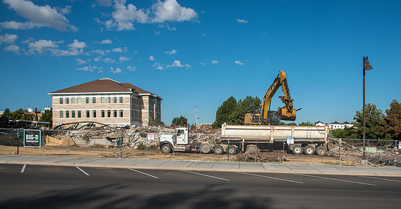Remnants of the old Kirkham Building being hauled away.