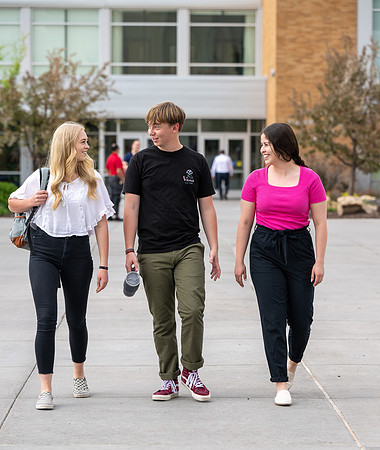 Student models for Admissions Viewbook cover options. May 2023