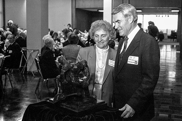 President and Sister Christensen looking at the replica statue