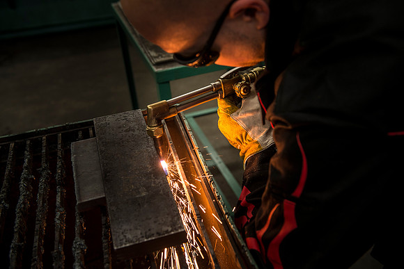 Students from the welding program, work on projects during class in the Austin Building.