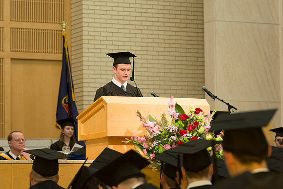 Grandon Rutter with the scripture reading at Convocation