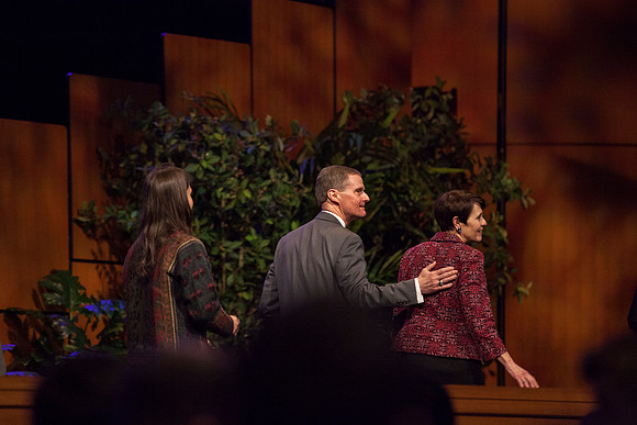 Elder Bednar says goodbye to those gathered at Devotional at the BYU-Idaho I-Center. Photo by Tyler Rickenbach