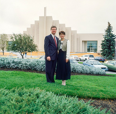 President and Sister Bednar pose in front of the Taylor Building.