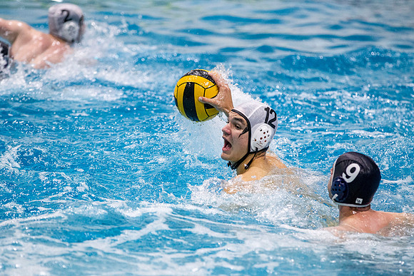 The BYU-Idaho competitive sports teams battle it out on the surface in an intense water polo game.