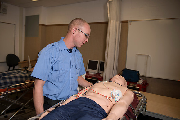 Cory Marriott and his peer pass off EMT requirements during lab held in the Clarke Building.