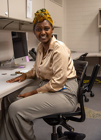 Assistant University photographer Hana Edossa at her work station.