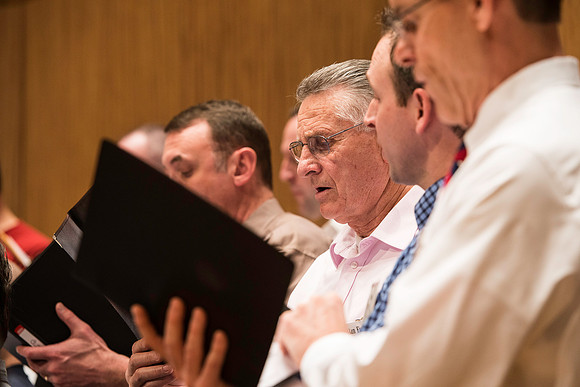 Ricks College Alumni from 1965 to 1995 gather for an A Cappella Choir reunion.